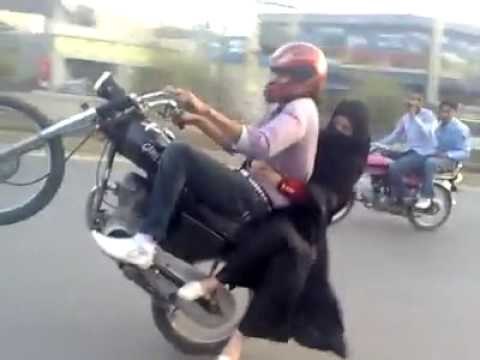 Lahori boy one wheeling with his girl friend