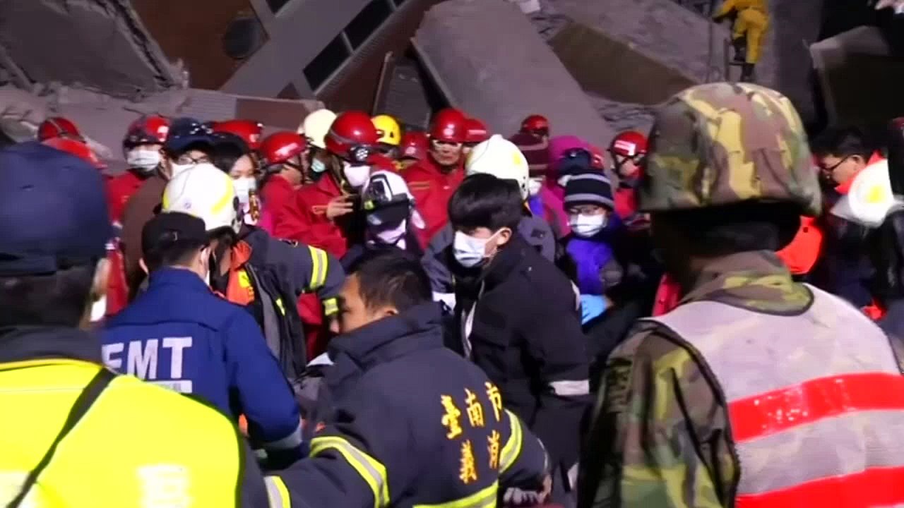 Baby and child rescued from quake-hit building