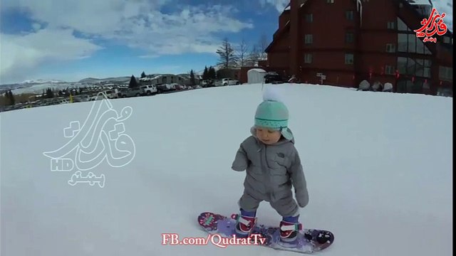 14-month-old snowboarder takes to Utah's ski slopes