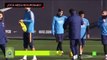 Lionel Messi aims a shot at Gerard Pique’s head in Barcelona training