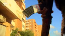 Benghazi: Libyan frontline as fighters battle IS - BBC News