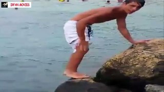 Little Guy Jumping Into Water Back Jump Stunt