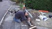 Laying concrete edging stones to driveway