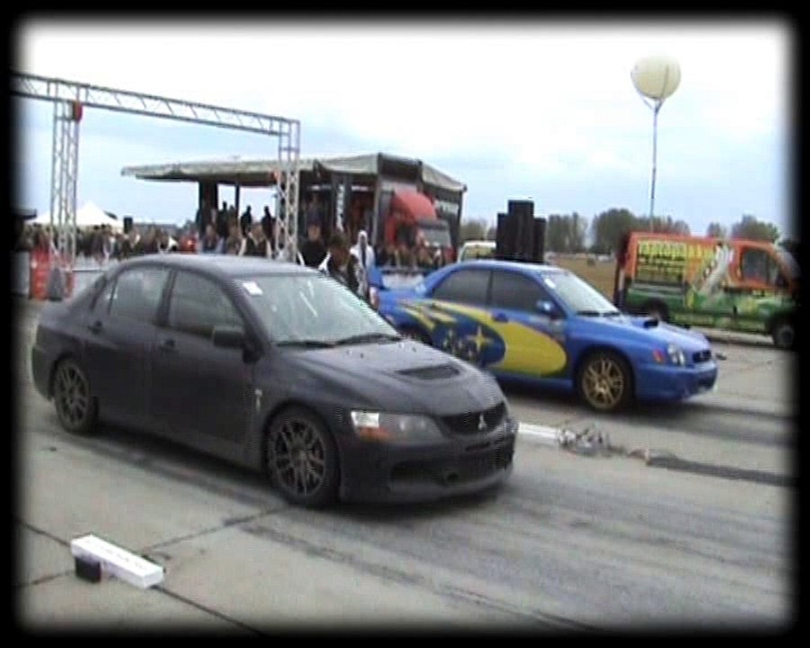 Mitsubishi Lancer EVO IX Vs. Subaru Impreza WRX STI Drag Race