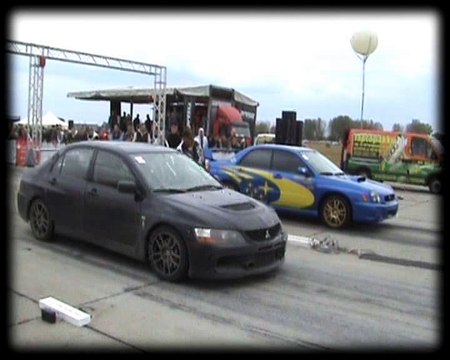 Mitsubishi Lancer EVO IX Vs. Subaru Impreza WRX STI Drag Race