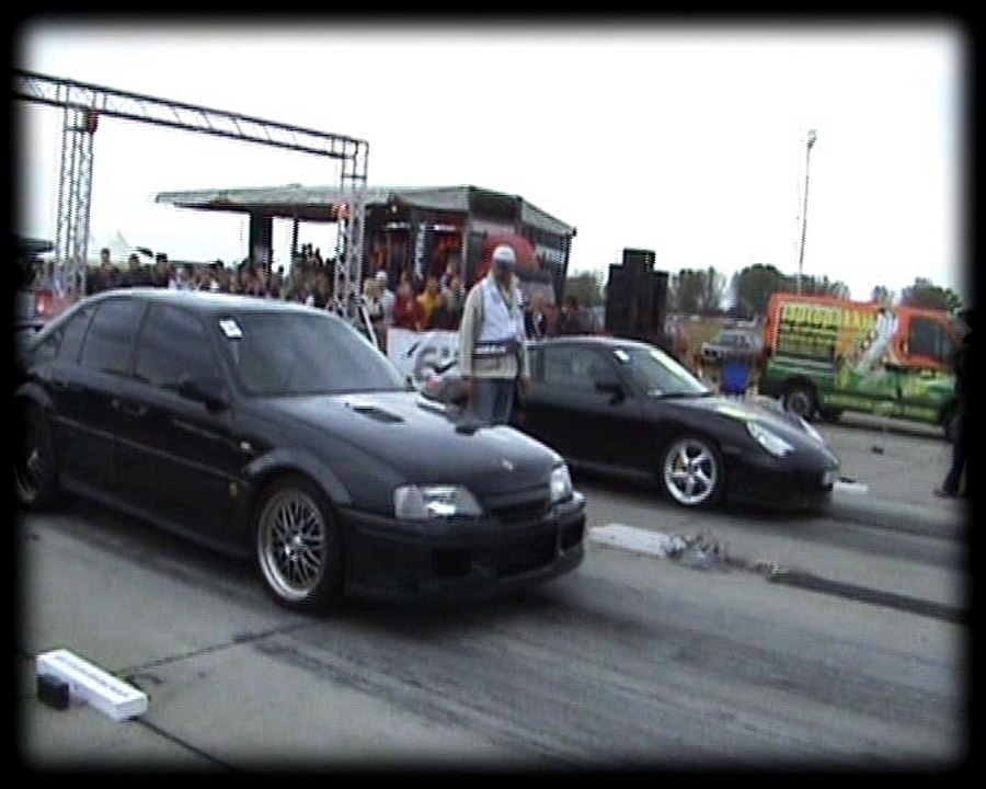 Porsche 996 Turbo Vs. Lotus Omega Drag Race