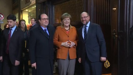 هولاند وميركل يسعيان لحل أوروبي لقضية اللاجئين