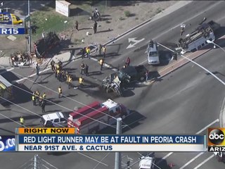 Red light runner may be at fault in Peoria crash