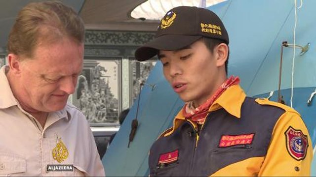 Taiwan quake rescuers pull survivors from debris