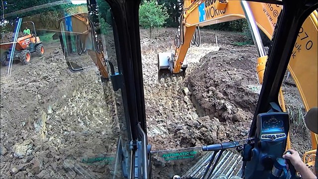 Heavy Equipment Parts - Excavator loading Dumpers