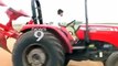 Little driver drive a tractor this boy is very small