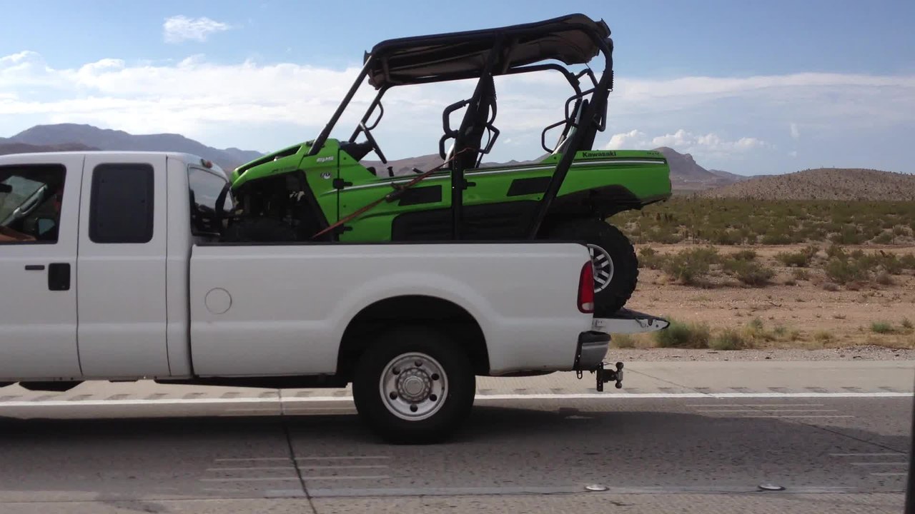 The kawasaki Teryx 4 UTV SxS fits in the back of a full-size pickup!