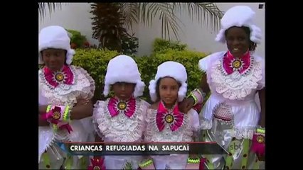 Download Video: Crianças refugiadas de guerra desfilam na Marquês de Sapucaí