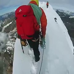 A man walking on glashiar very amazing