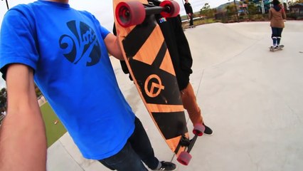 SKATEBOARDER OLLIES MASSIVE GAP ON A LONGBOARD!