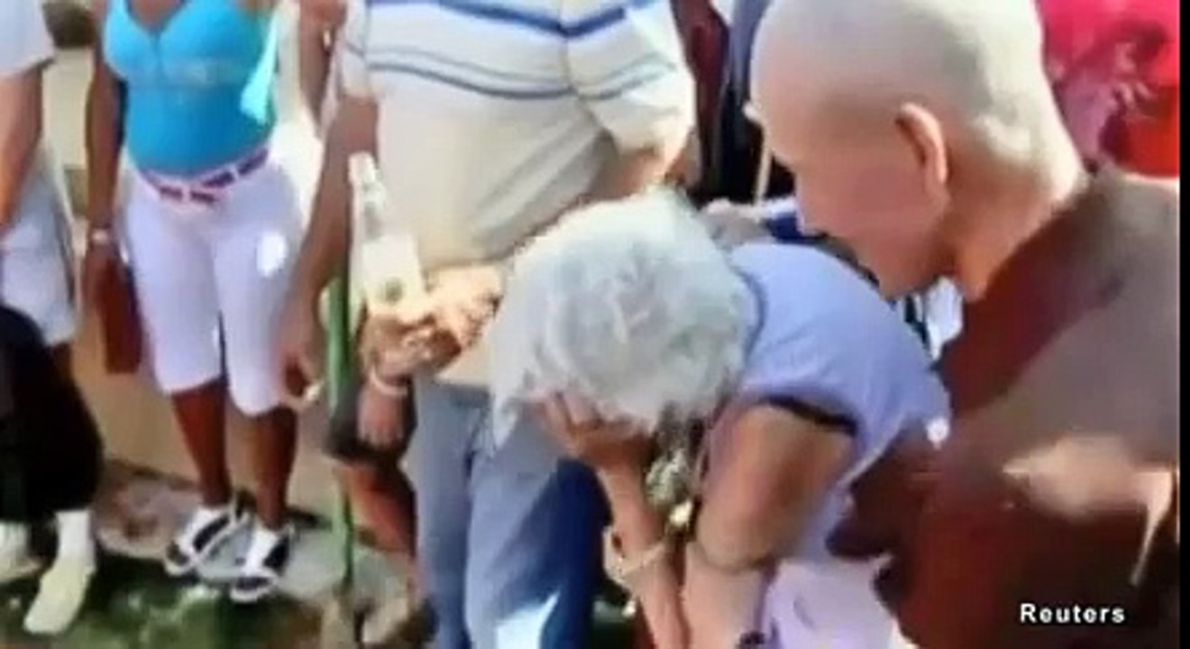 Cubans 'bury' man in grave for mock funeral