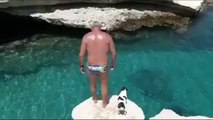 WOW !!! Dog jumps into the water with his owner !