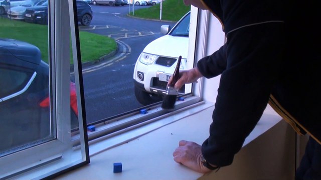 Installing or fitting a double glazed sealed unit