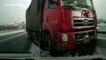 Scooter rider escapes death after falling under truck on icy China road