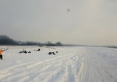 Drones Propel Snowboarders Across Latvian Airbase