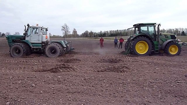 Тракторы – ХТЗ Т-150к vs John Deere, кто сильнее-