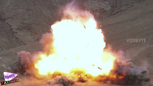 ISIS video shows British boy dubbed 'Jihadi Junior' blowing up four alleged spies