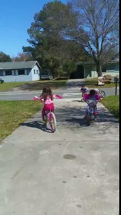 Little Girl on Bicycle Crashes into Mailbox