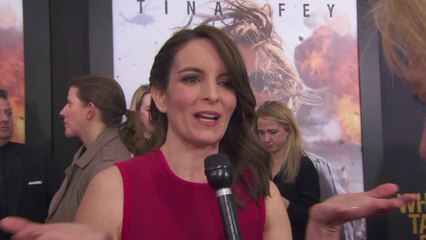 Tina Fey Grabbed By Margot Robbie At 'Whiskey Tango Foxtrot' Premiere