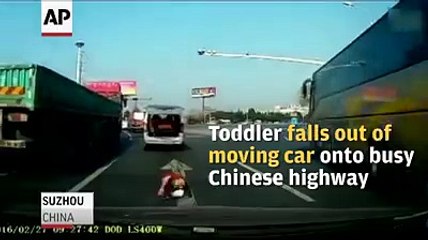 Shocking footage shows toddler fall out of moving car