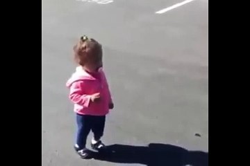 Little girl scared with own shadow