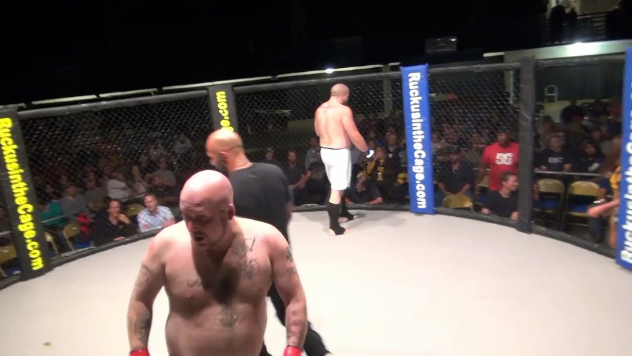 Fighter craps all over cage mat during fight!