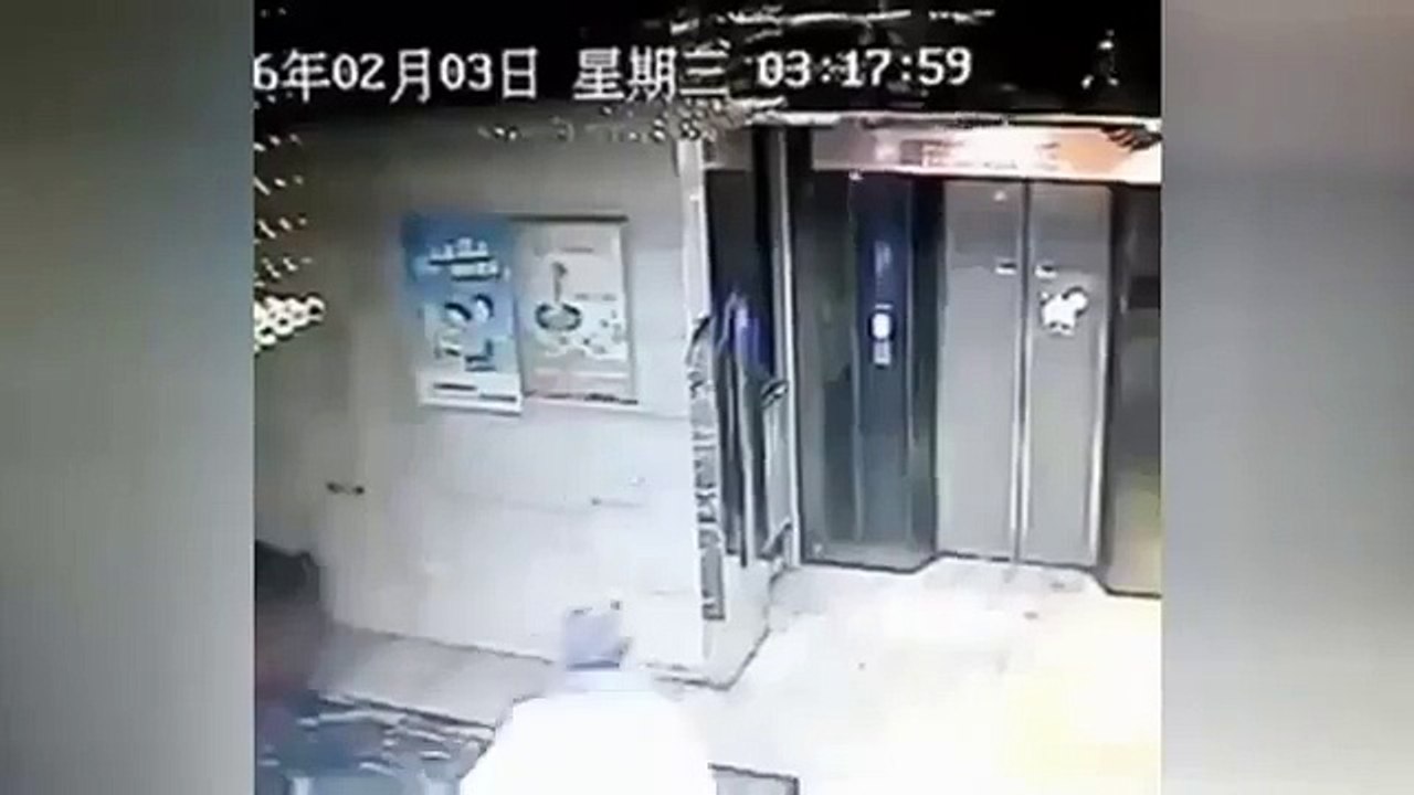 CHINESE MAN FALLS INTO ELEVATOR SHAFT AFTER KICKING DOORS OPEN