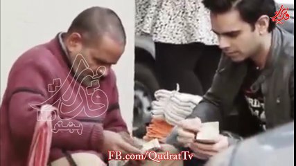 A visually impaired man was selling things and then. watch