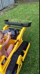 Australian Dad buys his daughter a Bulldozer, so she can help with the lawns