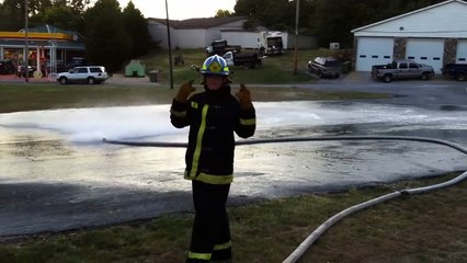 Kid gets owned by fire hose