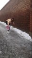 Girl Struggles to Walk on Ice
