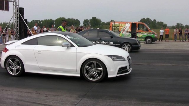 Audi TTS Vs. Mercedes E55 AMG