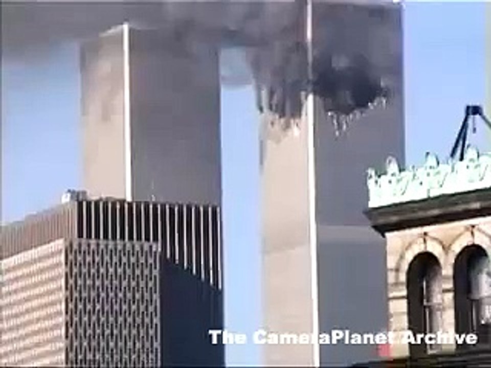 Clear shot of plane hitting tower two and tower in goes up...