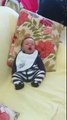 Adorable baby discovers feet for first time