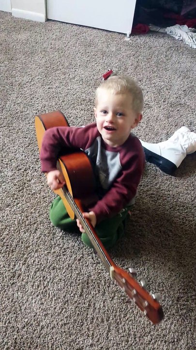 Days of Elijah. ..by Little Child Who Thinks He is A Pro With The Guitar