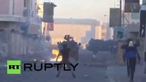 Bahrain : auto della polizia bruciate ed i manifestanti si scontrano (720p Full HD)