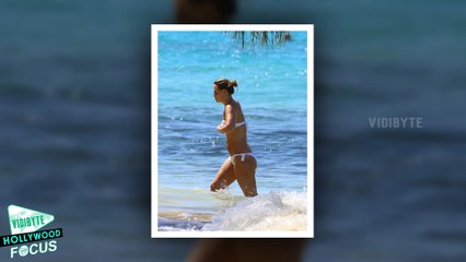 Kimberley Walsh Shows off her Pert Posterior in White Bikini