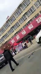 Wife stomps windshield after catching husband and mistress in car