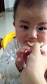 Baby eats lemon first time