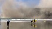 Dust Engulfs Christchurch Cliffs After Quake