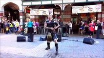 Scottish Kilt Man Performs AC DCs Thunderstruck On Flaming Bagpipes