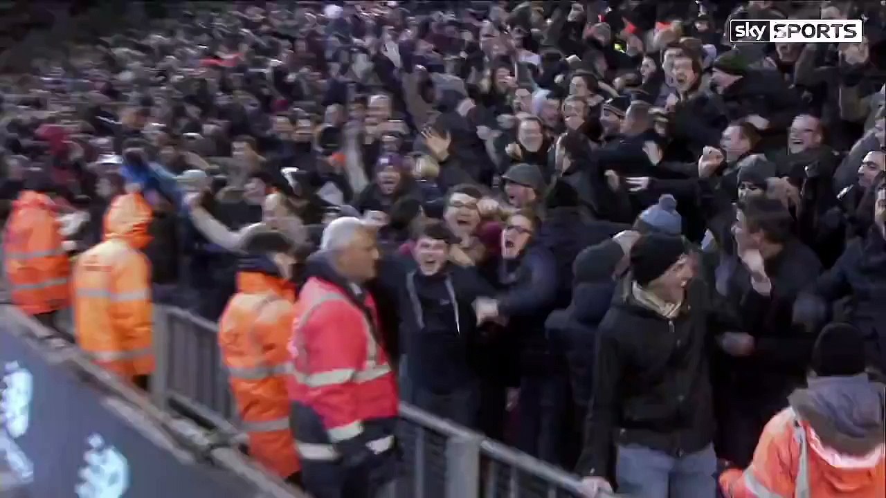 Phil Jones Celebrates In The Anfield Crowd