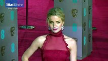 Annabelle Wallis is ravishing in red gown on BAFTA red carpet