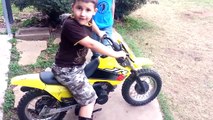 Little kid runs staight into fence with dirt bike - Try not to laugh or grin
