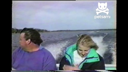 Man gets up close and personal with a goose on his boat